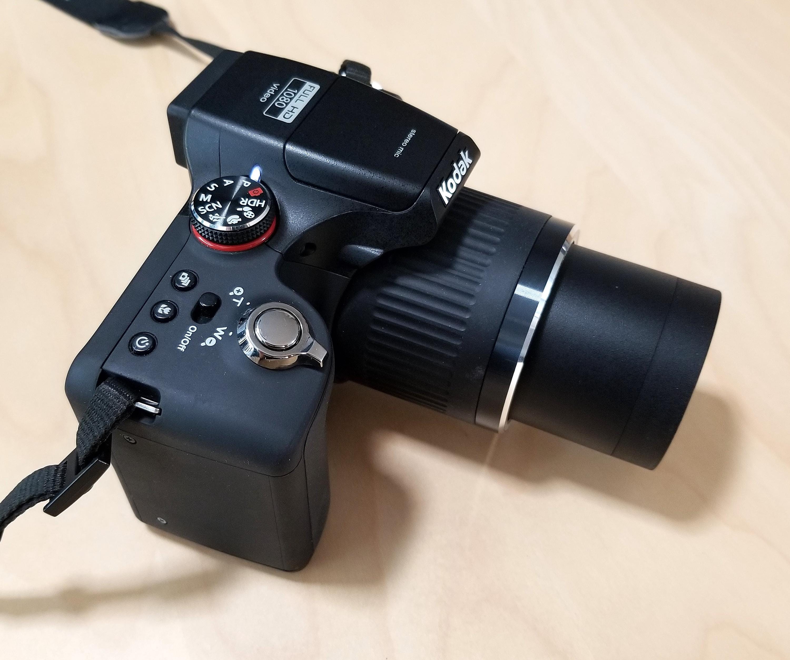 Kodak EasyShare Max Z990 IS 12MP Digital Camera w/ Schneider-Kreuznach 28-840mm Zoom Lens, Strap, Inst, Cap, Nylon Case, Charger, Batteries Kodak EasyShare Max Z990 IS 12MP Digital Camera w/ Schneider-Kreuznach 28-840mm Zoom Lens, Strap, Inst, Cap, Nylon Case, Charger, Batteries