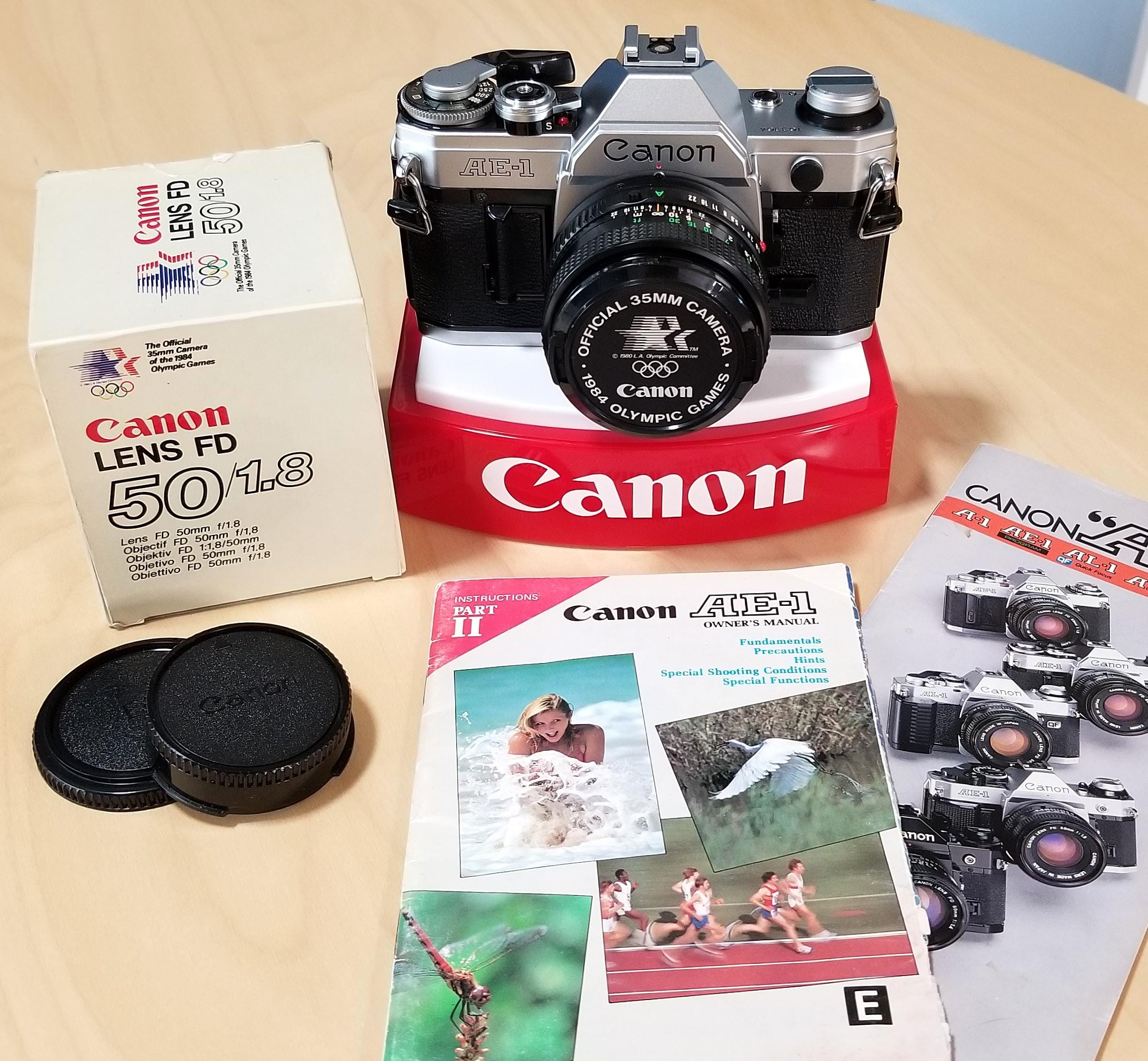 Canon AE-1 Program 1984 LAオリンピック記念ベルト付き Canon AE-1 Program 35mm Camera 1984 Olympic Games Lens Cap