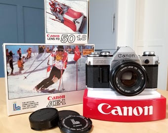 Canon AE-1 1980 Olympics 35mm SLR Camera Set w/ 50mm f1.8 Lens, Boxes, Power Winder A, Instructions - Tested, Professionally Serviced