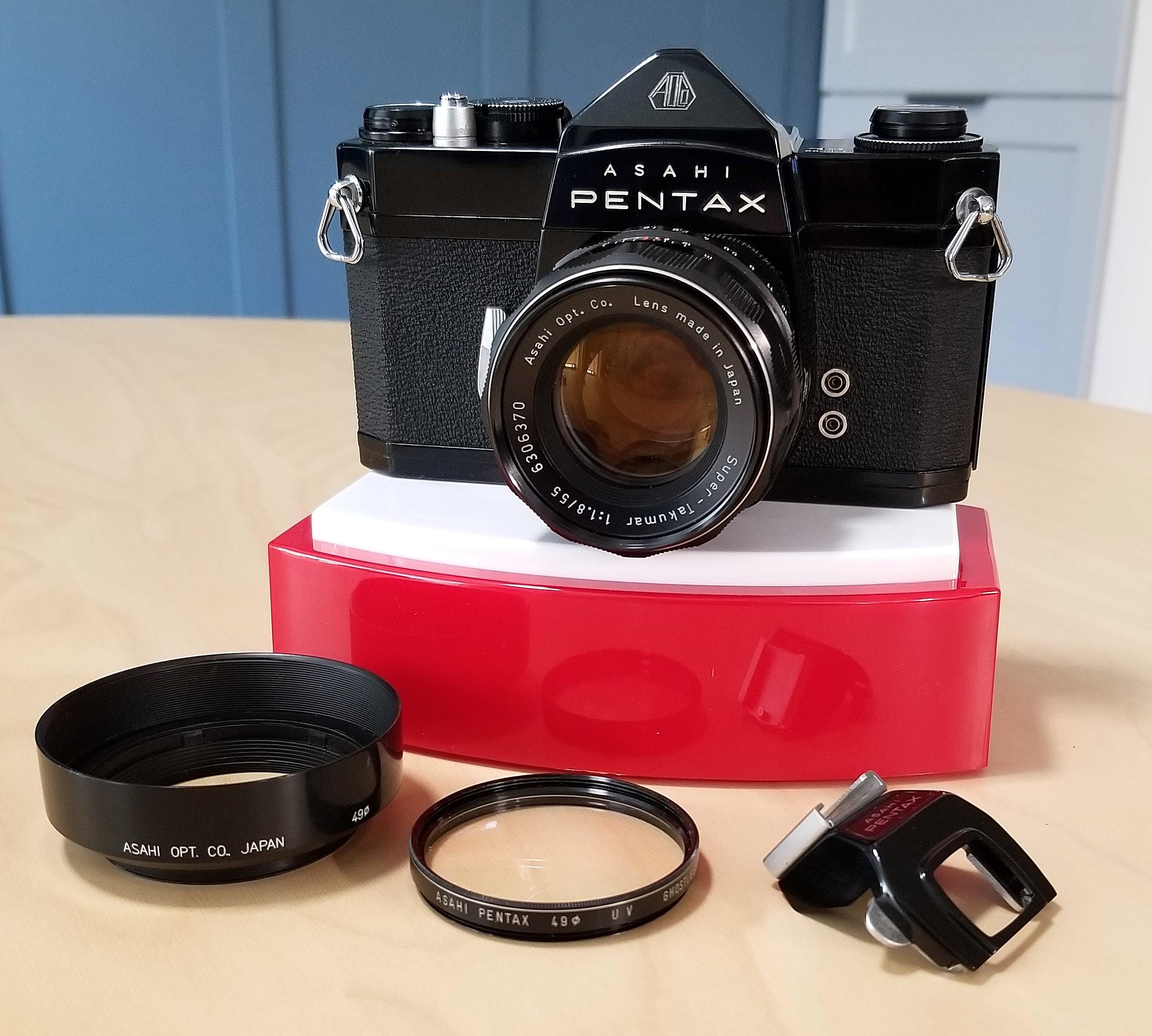 Classic Asahi Pentax SL 35mm SLR Film Camera w/ Super-Takumar 55mm f/1.8 Lens, Instructions, UV Filter, Pentax Hood, Cold Shoe - 100% Tested Classic Asahi Pentax SL 35mm SLR Film Camera w/ Super-Takumar 55mm f/1.8 Lens, Instructions, UV Filter, Pentax Hood, Cold Shoe - 100% Tested