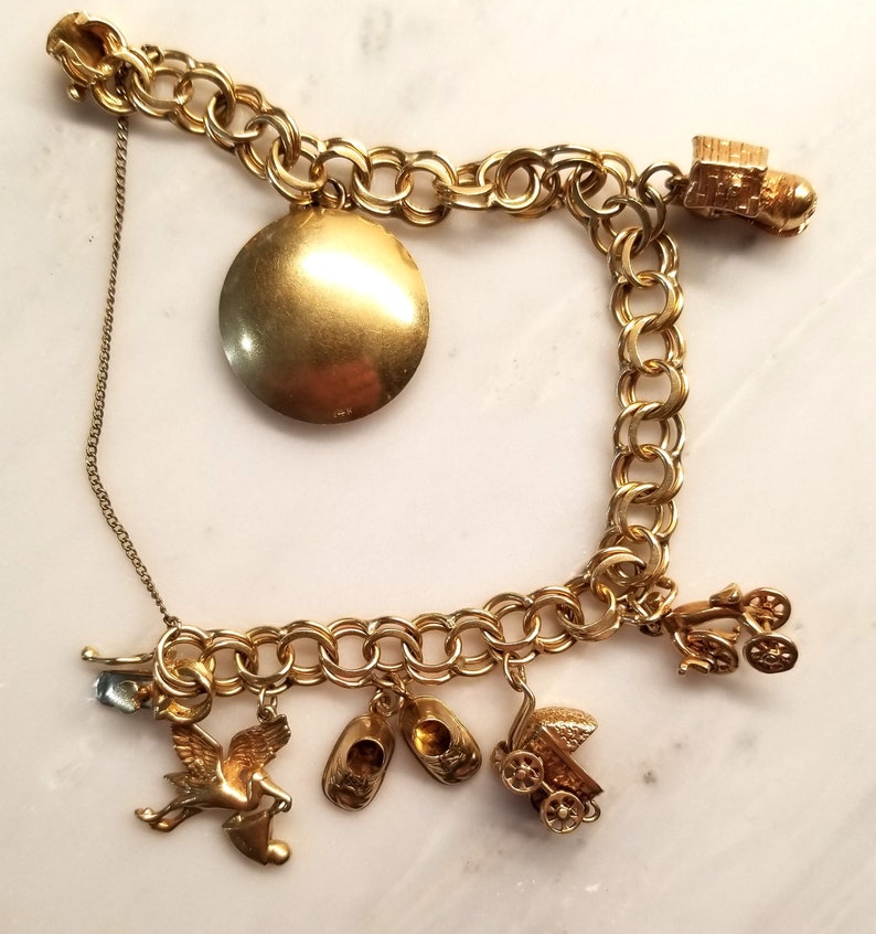 Vintage 14k Gold Charm Bracelet With 7 Charms 35 Grams 14k Gold 1 Owner