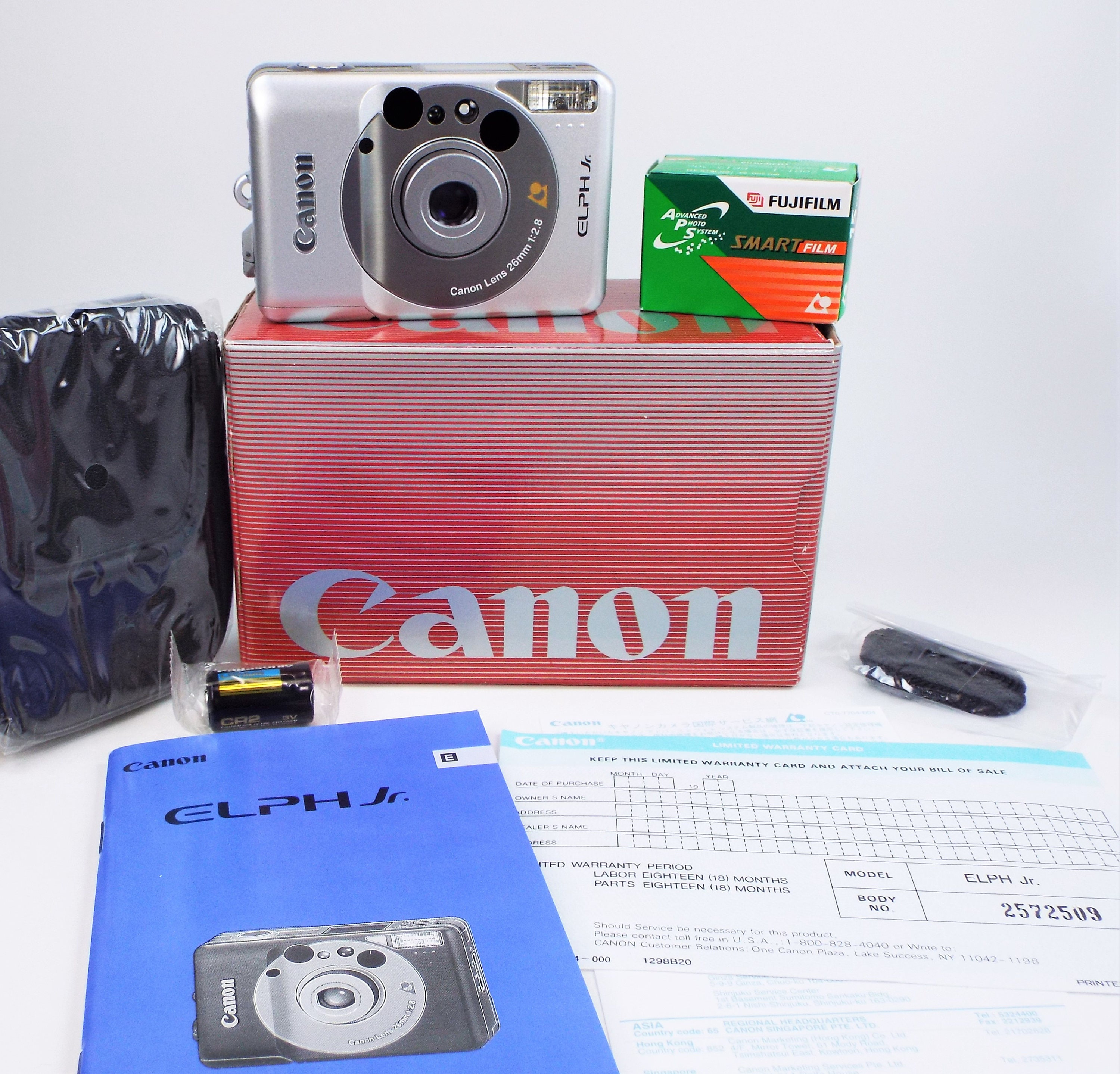 Canon ELPH Jr. APS Film Camera Outfit Mint New in Box Canon 26mm f/2.8 Lens Owners Book