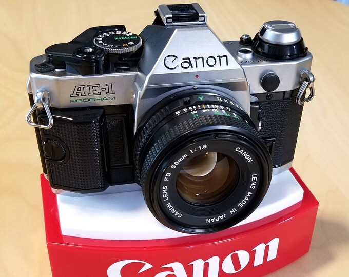 Classic Canon AE-1 Program 35mm SLR Film Camera w/ Canon NFD 50mm f1.8 Lens, Caps, Flash - Super Clean & Film Tested - Instructions - Mint