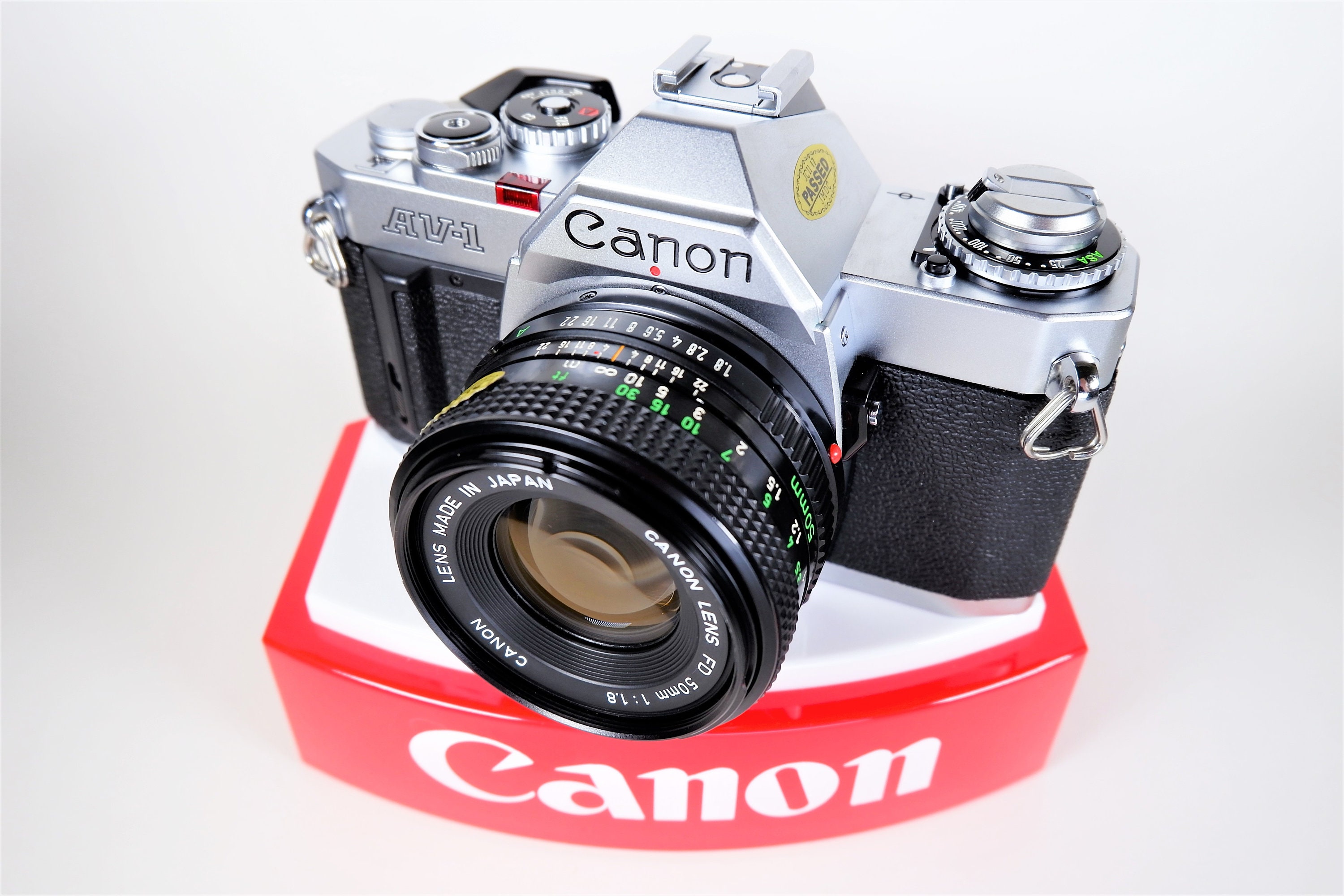 Canon AV1 35mm Single Lens Reflex (SLR) Film Camera w/ Canon NFD 50mm