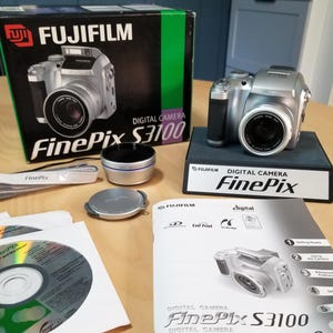 Fujifilm FinePix S3100 4MP Digital Camera Set - Includes xD Card - CCD Digicam w/ Fujinon 6x Zoom Lens, Box, Cap, Strap, CDs, Instructions