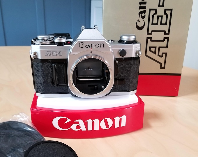 Classic Boxed Canon AE-1 35mm SLR Camera w/ Canon Body Cap - Film Tested, New Battery, Canon Strap, All Books, Card - Minty Fresh