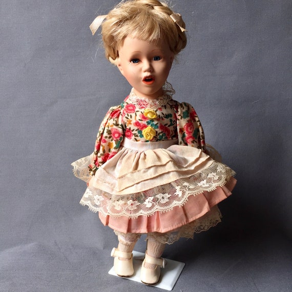 porcelain dolls with numbers on neck