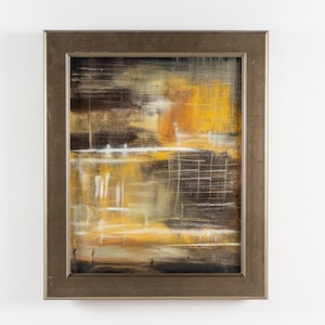 May include: Abstract painting in a gold frame with shades of brown, yellow, and white. The painting has a textured look with brushstrokes visible.