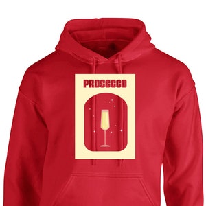 May include: Red hooded sweatshirt with a yellow rectangle graphic featuring the word "PROSECCO" and a glass of champagne.