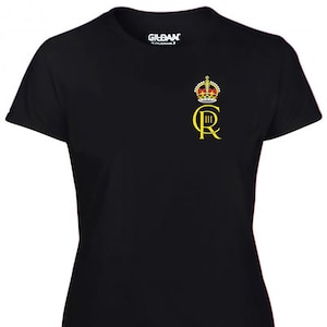 May include: Black t-shirt with a gold embroidered crown and the letters "C R III" on the left chest.