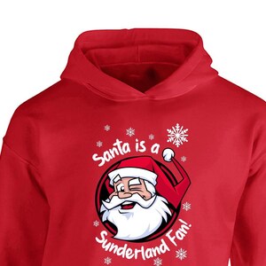 Barnens jultomte är ett Sunderland-fan! Hoodie Fan-made Merchandise Barn INGA DRAGSNÖREN