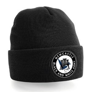 May include: Black beanie with a round patch that says "Newcastle Black and White Army" with a magpie and a castle graphic.