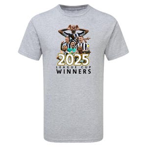 May include: A gray t-shirt with a black and white photo of a group of soccer players celebrating. The text "2025 LEAGUE CUP WINNERS" is printed in gold on the shirt.