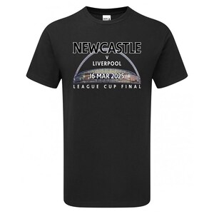 May include: Black t-shirt with white text that reads "NEWCASTLE v LIVERPOOL 16 MAR 2025 LEAGUE CUP FINAL". The text is arched over a graphic of a stadium.