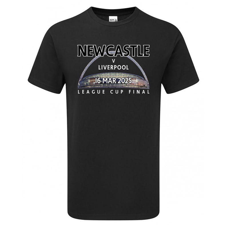 May include: Black t-shirt with white text that reads "NEWCASTLE v LIVERPOOL 16 MAR 2025 LEAGUE CUP FINAL". The text is arched over a photo of a stadium.