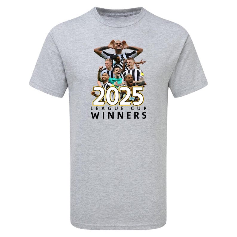 May include: A gray t-shirt with a black and white photo of a group of soccer players celebrating. The text "2025 LEAGUE CUP WINNERS" is printed in gold on the shirt.