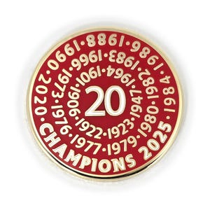 May include: A red and gold circular pin with the text "20 CHAMPIONS" and a white circle with the number "20" in the centre. The pin also features a ring of numbers around the outside, including the years 1976, 1977, 1979, 1980, 1986, 1996, 1996, 2006, 2016, 2020, 2025.