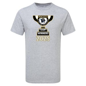 May include: A grey t-shirt with a trophy design. The design includes the text "NEWCASTLE BLACK AND WHITE ARMY CUP WINNERS 2025". The trophy is black, white, and gold. The shirt is made of a soft material.