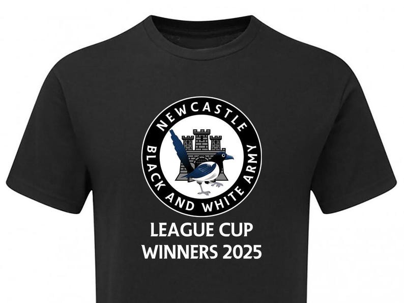 May include: Black t-shirt with a white circle logo that says "Newcastle Black and White Army" with a black and white magpie and a castle inside. The text "League Cup Winners 2025" is below the logo.