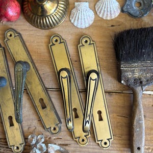 2 vintage Italiaanse gouden sloten, hendel aan de binnenzijde