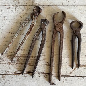 Old workshop work tools, collectible pliers and pincers, Garage-loft decorations, Steampunk style, Urban style interior design