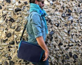 Turquoise waxed canvas messenger bag with blue recycled leather flap