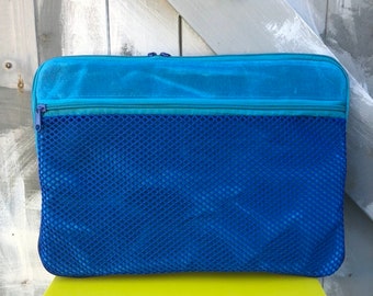 Turquoise waxed canvas 13” padded laptop case with front mesh pocket