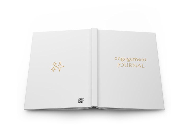 May include: A white engagement journal with the text "engagement JOURNAL" on the cover. The cover also features a small gold star design.