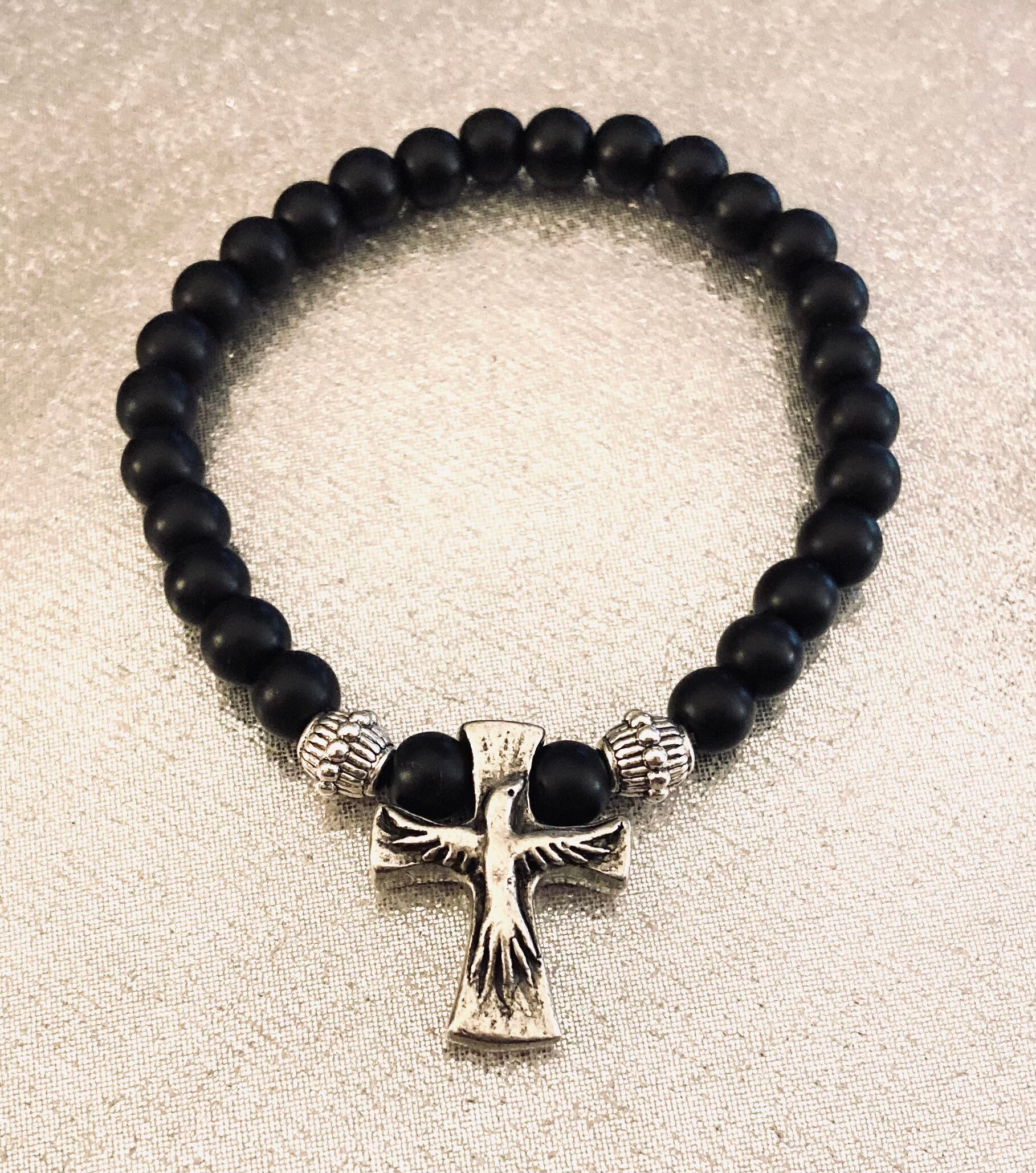 Holy spirit dove bracelet with rich black beads Etsy