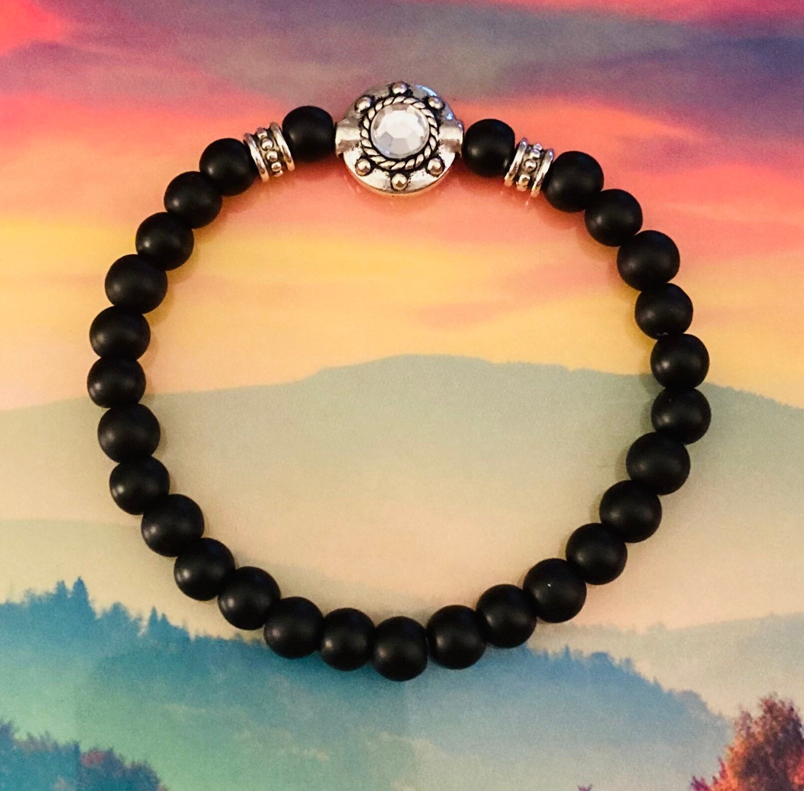 Black beaded stretch bracelet with center round crystal bead. | Etsy