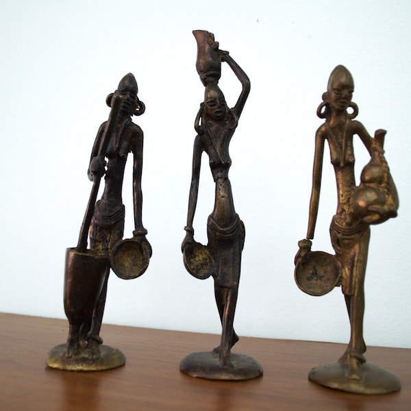 Set of Three Bronze or Brass Statuettes Representing African Women. Hand Made in Africa. Midcentury Vintage.