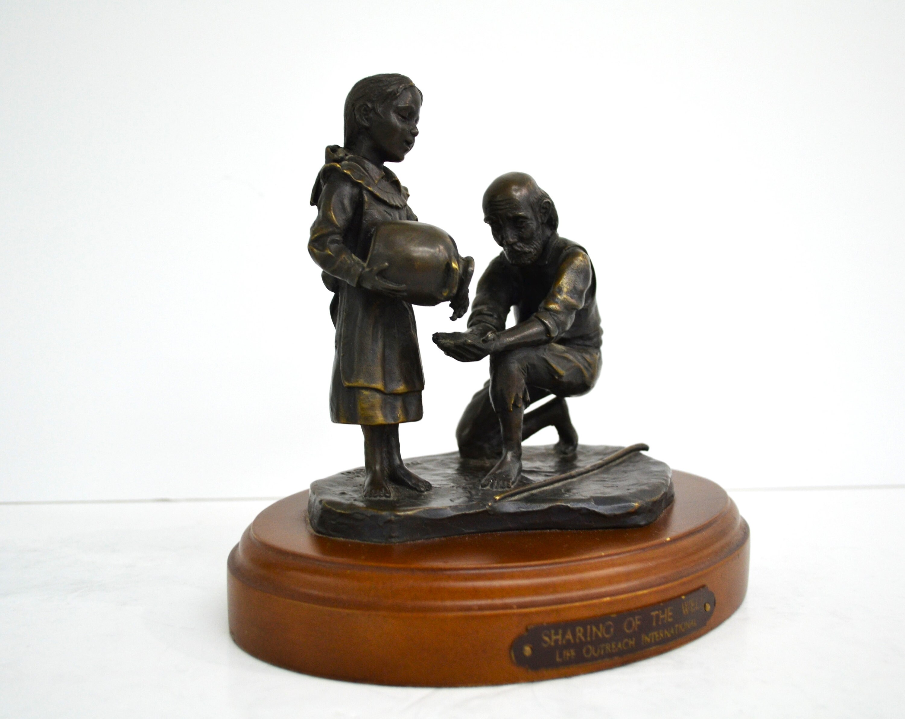 Bronze Sculpture  "Sharing of the Well" by Dean Shipston.  Life Outreach International Series.  Signed by the Sculptor.
