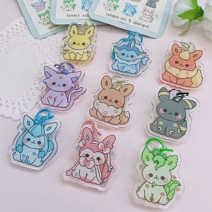 Mystery Chibiution Blind Bag - 1 zufällige Acryl Schlüsselanhänger - 9 Designs!