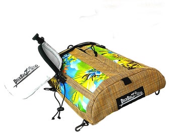 May include: A brown and tan woven bag with a tropical print and a black zipper. The bag has a black strap and a small white pouch with the text "DeckBagZ" printed on it.
