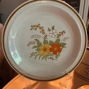 Stoneware plate with floral design,  from JCPenney&#39;s 1970s collection This is a serving plate 12.5”