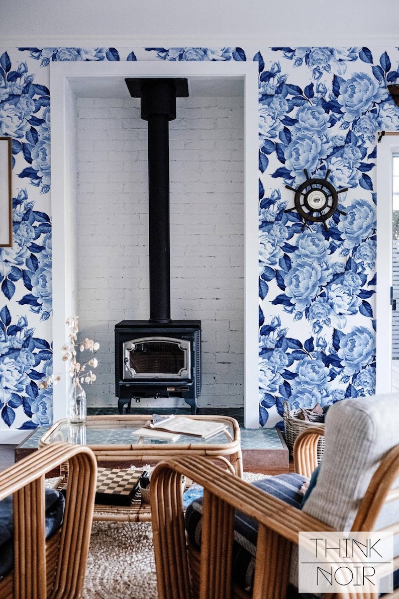 Scandinavian style living room with large flower pattern in royal blue color.