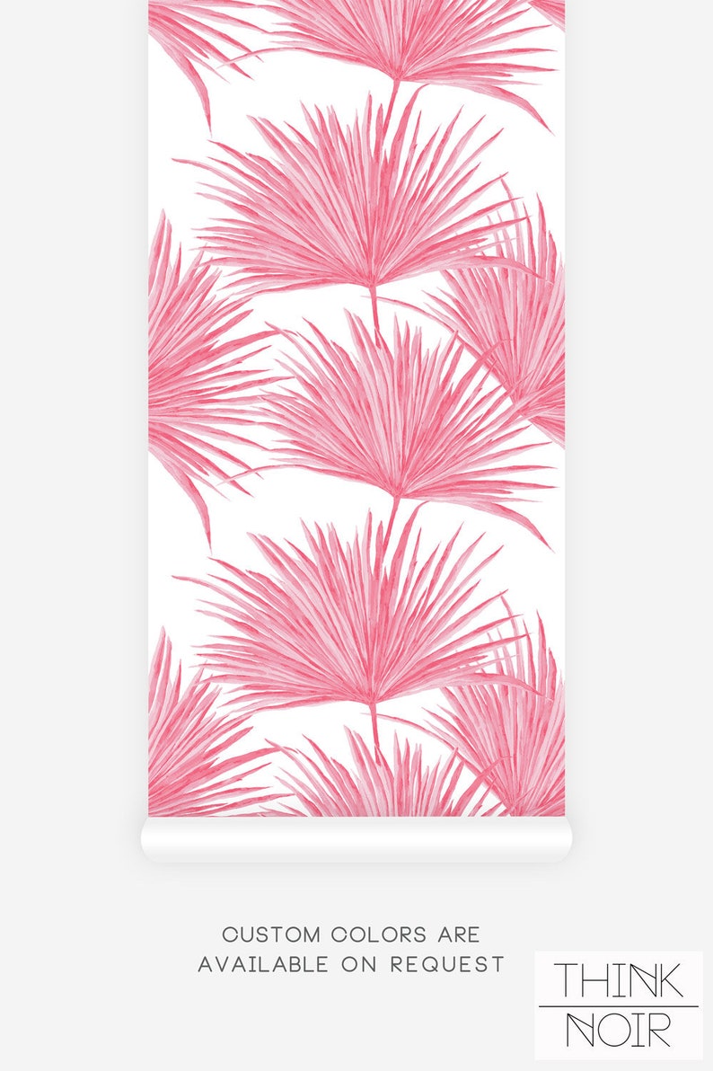 Tropical leaf print wallpaper in a vibrant pink color