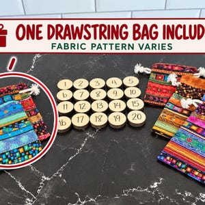May include: A set of twenty round wooden tokens numbered one through twenty, accompanied by a colorful fabric drawstring bag. The text ONE DRAWSTRING BAG INCLUDED FABRIC PATTERN VARIES is displayed at the top of the image.
