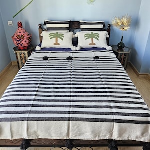 Moroccan blanket in white cotton with black stripes and pompoms - Handmade