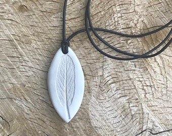 Ceramic Necklace Pit Fired White Leaf Impression on Leather Thong