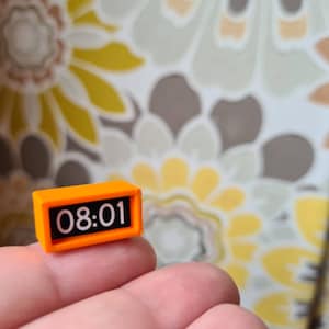 Vintage retro 70s style Lundby Dolls house alarm clock orange
