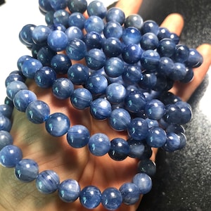 AAA Kyanite Gemstone Beads: 11-12mm Round Blue Flash, 7 Inch Strand
