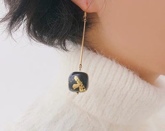 Premium sparkle. Gift for her. Dangle earrings. Drop earrings. Gold earrings. Glitter earrings. Black and gold earrings. Black earrings.
