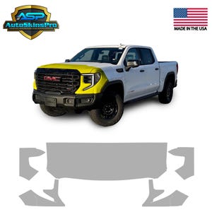 May include: A white GMC truck with a yellow front end wrap. The truck has black wheels and a black grill. The image includes the text "AutoSkinsPro" and "Made in the USA".