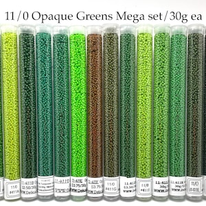 May include: A set of 11/0 opaque green seed beads in 10 different shades, each tube containing 30 grams of beads. The tubes are labelled with the bead size, colour number, and website address.