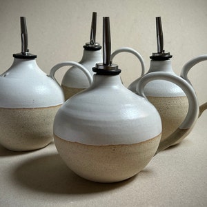 Oil pourer