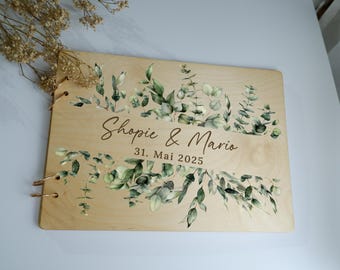 Elegante libro de visitas de boda de madera con motivos botánicos