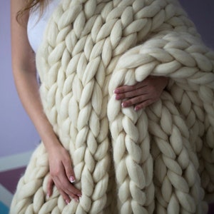 Hand knitted chunky merino wool blanket, arm knit throw. The Expecting Mum Gift