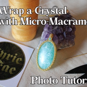 May include: A turquoise crystal wrapped in gold micro-macrame with a photo tutorial. The image also shows a spool of thread, a needle, scissors, and a purple amethyst crystal.
