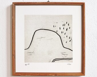 May include: A black and white abstract print of a landscape with a hill and a scattering of dots. The print is framed in a wooden frame and has the text "PK-17" and "1/160" in the bottom corners.